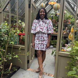 Angellica Bell at RHS Chelsea 2026 Alitex Greenhouse Floral Bow Neck Dress Bow Neck Swing Jacket and Shift Dress. Pink and white Floral Bow Neck outfit Chelsea Lorelei London Pink Floral Print Inspired by The Kings Rose. Floral Mini Dress with Bow and sleeves. What was Angellica Bell wearing at RHS Chelsea on Friday 22nd May 2026