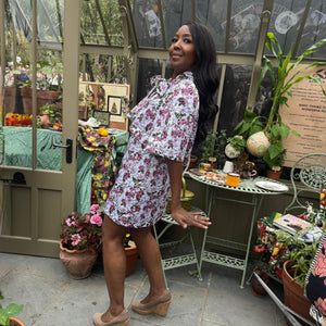 Angellica Bell at RHS Chelsea 2026 Alitex Greenhouse Floral Bow Neck Dress Bow Neck Swing Jacket and Shift Dress. Pink and white Floral Bow Neck outfit Chelsea Lorelei London Pink Floral Print Inspired by The Kings Rose. Floral Mini Dress with Bow and sleeves. What was Angellica Bell wearing at RHS Chelsea on Friday 22nd May 2026. Made in The Uk, Sustainable Fashion Brand. August Beth vegetable emporium. Presenters outfits at Chelsea