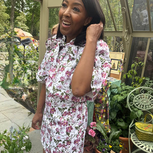 Angellica Bell at RHS Chelsea 2026 Alitex Greenhouse Floral Bow Neck Dress Bow Neck Swing Jacket and Shift Dress. Pink and white Floral Bow Neck outfit Chelsea Lorelei London Pink Floral Print Inspired by The Kings Rose. Floral Mini Dress with Bow and sleeves. What was Angellica Bell wearing at RHS Chelsea on Friday 22nd May 2026. Made in The Uk, Sustainable Fashion Brand. August Beth Le Manoir