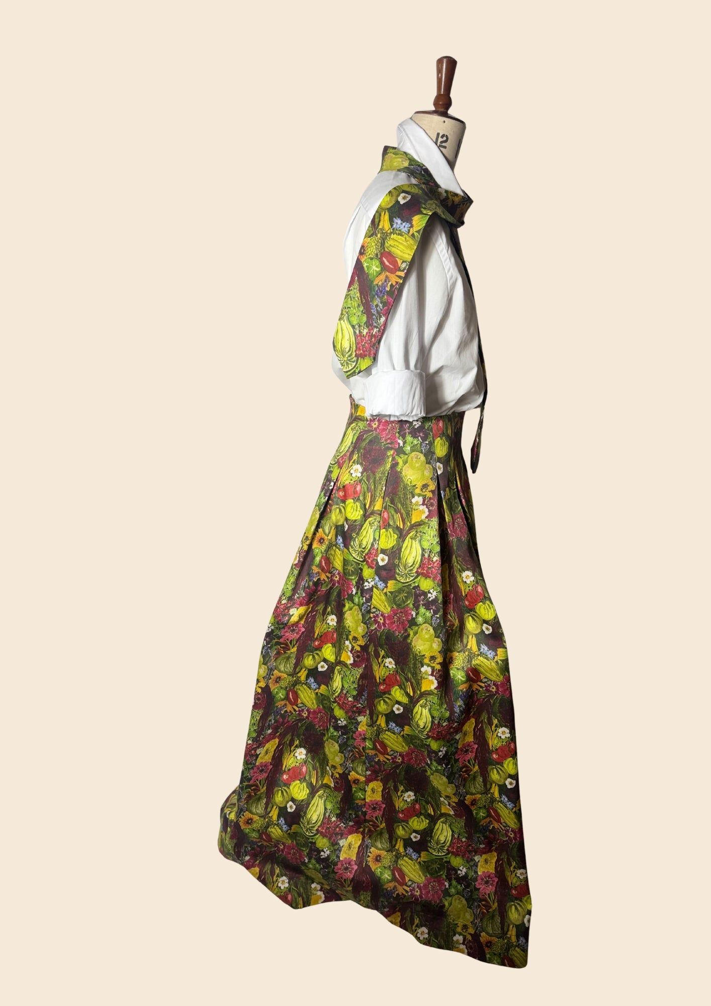 The Tie and skirt as seen on August Beth at RHS Chelsea 2026. Vegetable Emporium Alitex collaboration. Vegetable print inspired by Le Manoirs garden. Edible produce, Hand drawn prints. Sustainable Fashion brand Slow Fashion