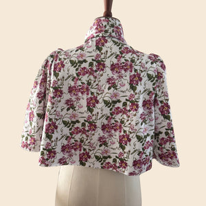 Back View on Mannequin of The Lorelei London Bow Swing Jacket part of a Two Piece set worn by Angellica Bell at RHS Chelsea 0n 22nd May 2026. Bow Dress style as seen on Angellica Bell. Sold separately Pink trailing floral print. What was Angellica wearing at Chelsea