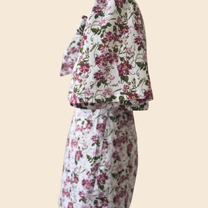 The_Bow_Swing_Jacket_Shift_Dress_in_a_trailing_Pink_Floral_Rose_print_inspired_by_The_Kings_Rose. Flat lay side view as seen on Angellica Bell at RHS Chelsea 2026. Iplayer Episode 9 on the BBC with MAry Berry giving out THe people choice award. Alitex Lorelei London Sustainable fashion brand.