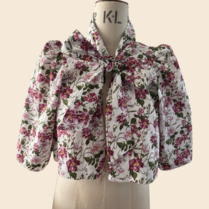 Floral Swing Jacket Blouse on a mannequin. Print by Lorelei London inspired by The Kings Rose. As seen on Angellica Bell at RHS Chelsea 2026. What was Angellica Bell wearing this year at The Chelsea Flower Show. Mini Floral Bow  Dress. As seen on the BBC