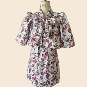 The Bow Swing Jacket & Shift Dress  (Two Piece) in a trailing Pink Floral Rose print inspired by The Kings Rose. Full Front flat lay image of the design on the mannequin. As seen on Angellica Bell at RHS Chelsea on Friday 22nd May. Sold Seperately 